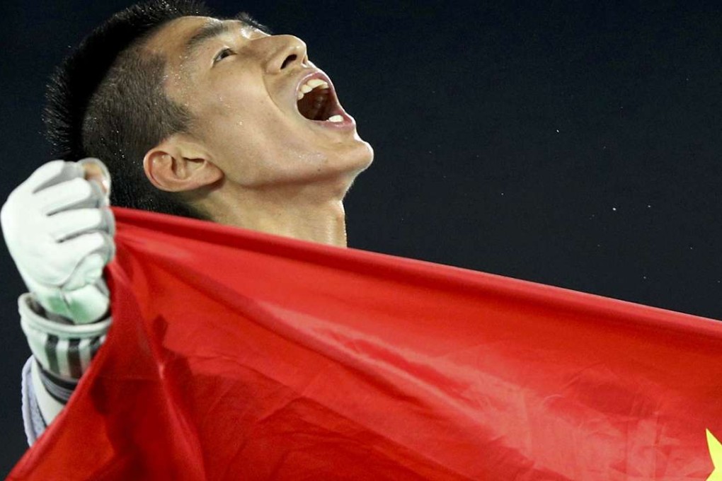 Zhao Shuai of China celebrates winning the men’s 58hk taekwondo final. Photo: Reuters