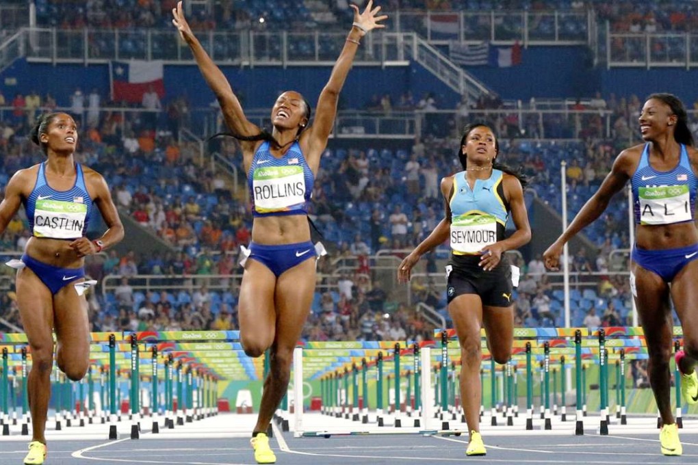 Brianna Rollins (2L) of the United States celebrates her victory alongside compatriots Nia Ali (R) and Kristi Castlin (L)in the 100-metre hurdles final in Rio. Photo: Kyodo