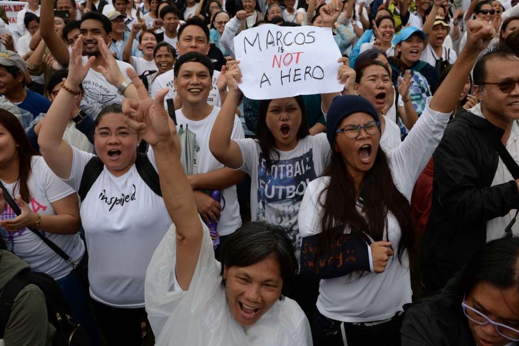 Protesters shout anti-Marcos slogans during a demonstration in Manila against plans to honour Ferdinand Marcos with a state burial. Photo: AFP