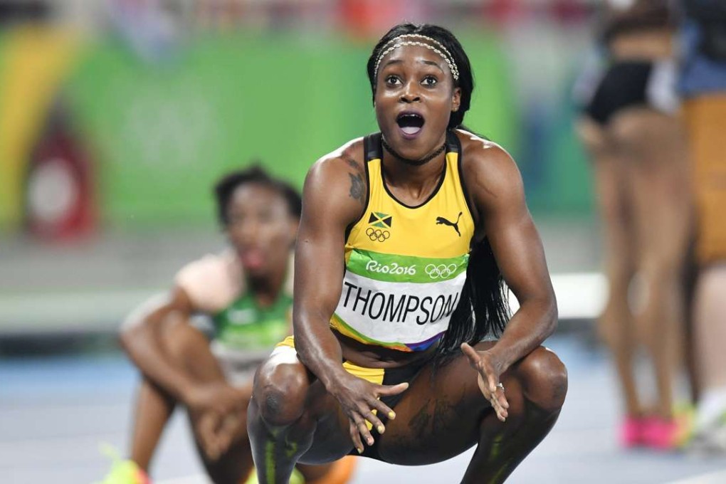 Elaine Thompson of Jamaica looks on in disbelief after taking the 200-metre title in Rio. Photo: EPA