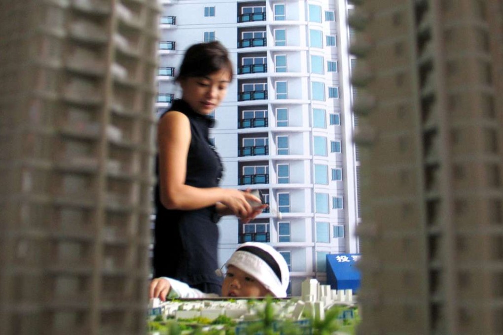 A new housing fair in Haikou, in Chinaís southern Hainan Province. Of the 70 cities surveyed in July, 51 saw new home prices climb month on month, down from 55 in June. Photo: EyePress News