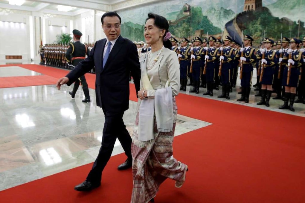 Premier Li Keqiang and Aung San Suu Kyi, Myanmar’s de facto leader, at a welcoming ceremony at the Great Hall of the People in Beijing. Photo: Reuters