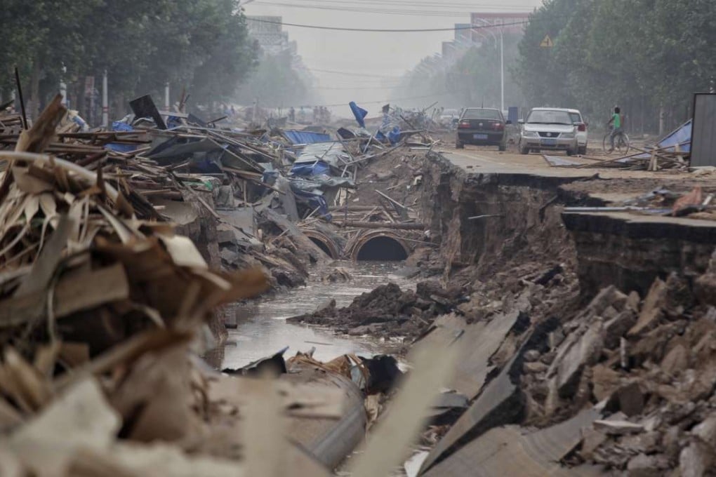 A damaged road in Xingtai following the flooding in July. Photo: Reuters