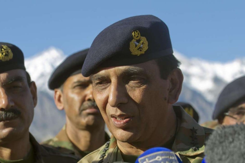 Ashfaq Parvez Kayani talks with reporters in 2012. Photo: AP