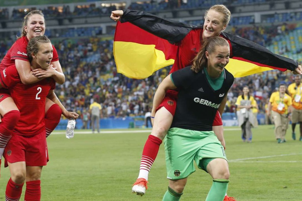 Germany players celebrate their victory over Sweden in the final of the women’s Olympic football tournament. Photo: AP