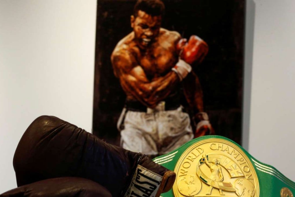 Belongings and the iconic 'Rumble in the Jungle' belt of late boxing champion Muhammad Ali are displayed for auction at Heritage Auctions house in Manhattan, New York. Photo: Reuters