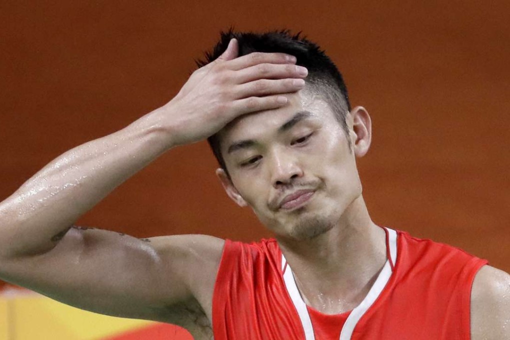 China's Lin Dan reacts after losing a point against Denmark's Viktor Axelsen. Photo: AP