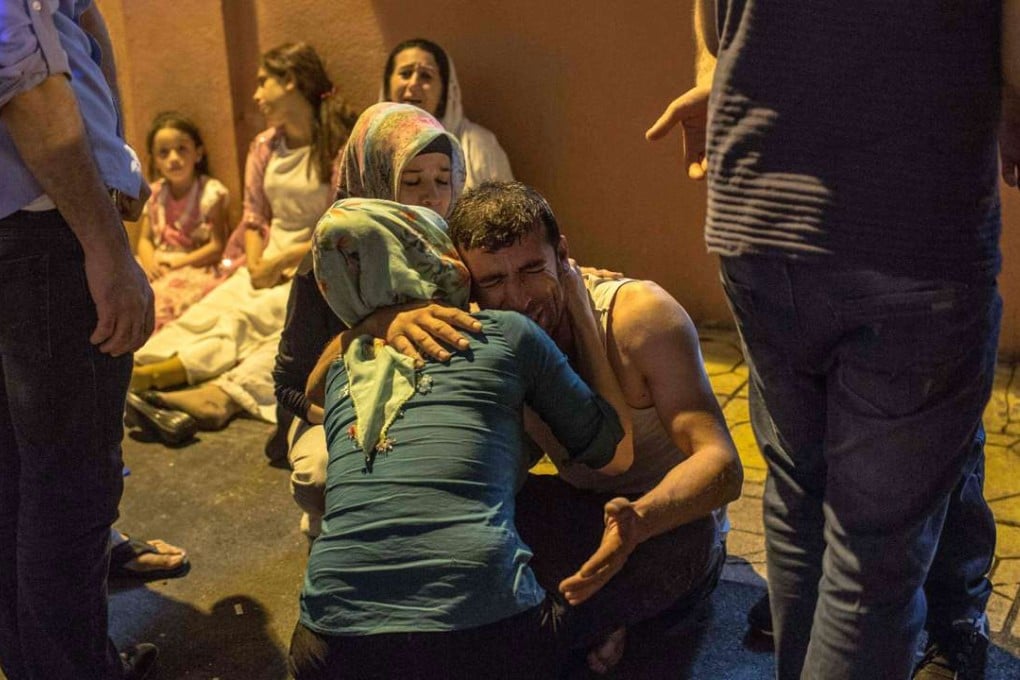 Relatives grieve in Gaziantep following a late night militant attack on a wedding party in southeastern Turkey. Photo: AFP