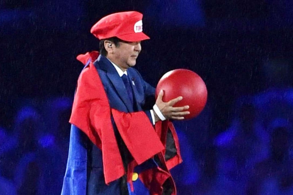Japanese Prime Minister Shinzo Abe, dressed up as Super Mario, makes an appearance during the closing ceremony of the Rio de Janeiro Olympics. Photo: Kyodo