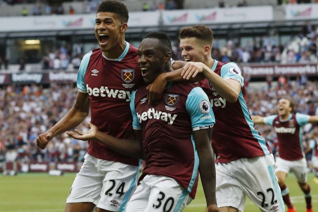 West Ham United's Michail Antonio celebrates scoring with Ashley Fletcher and Sam Byram. Photos: Reuters
