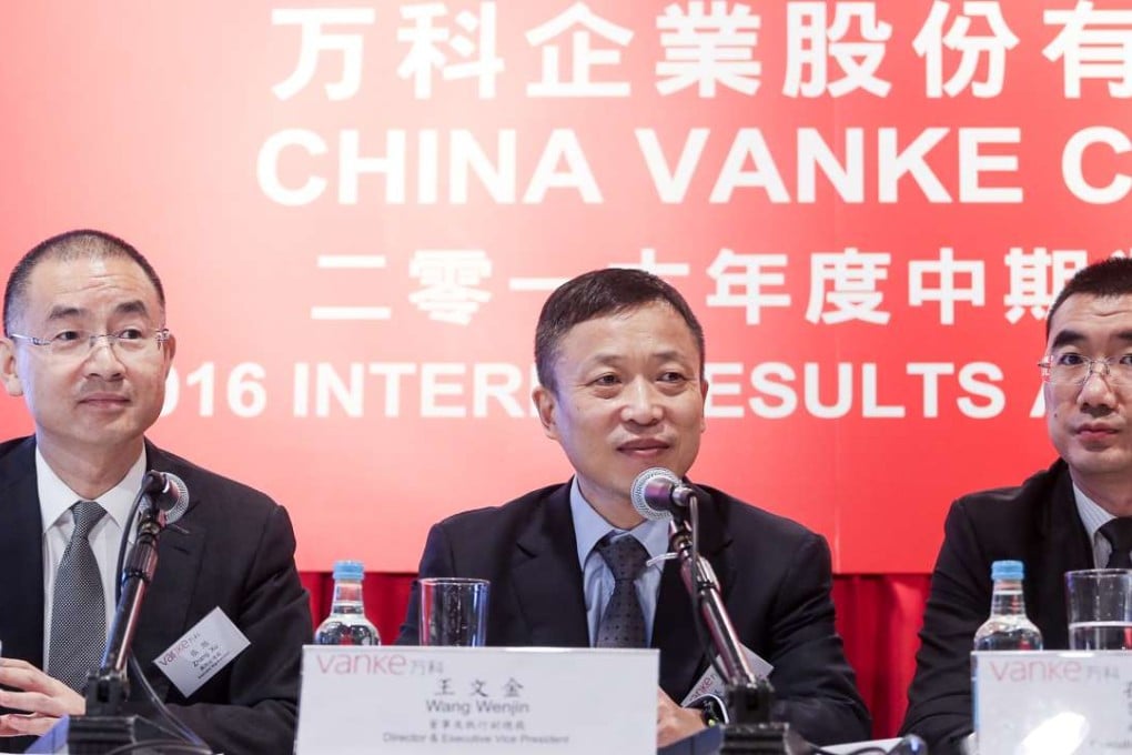 (L-R) Executive Vice President Zhang Xu, Director and Executive Vice President Wang Wenjin, and Executive Vice President Sun Jia are left to face the media at China Vanke Co’s Hong Kong press conference. Photo: SCMP