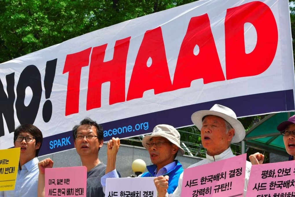 Activists protest against the deployment of the US-built Thaad anti-missile system outside the defence ministry in Seoul. Photo: AFP