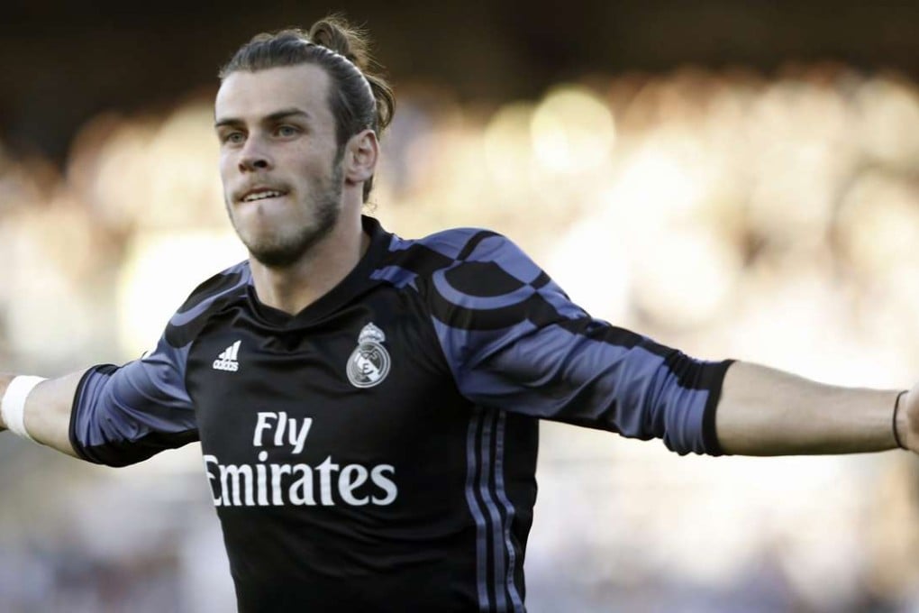 Real Madrid forward Gareth Bale celebrates after scoring the team's first goal against Real Sociedad. Photo: EPA