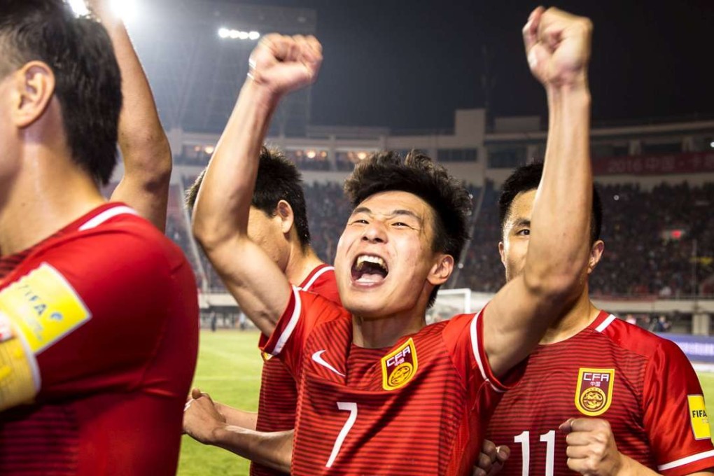 Wu Lei celebrates with China teammates after winning against Qatar. Photo: Reuters