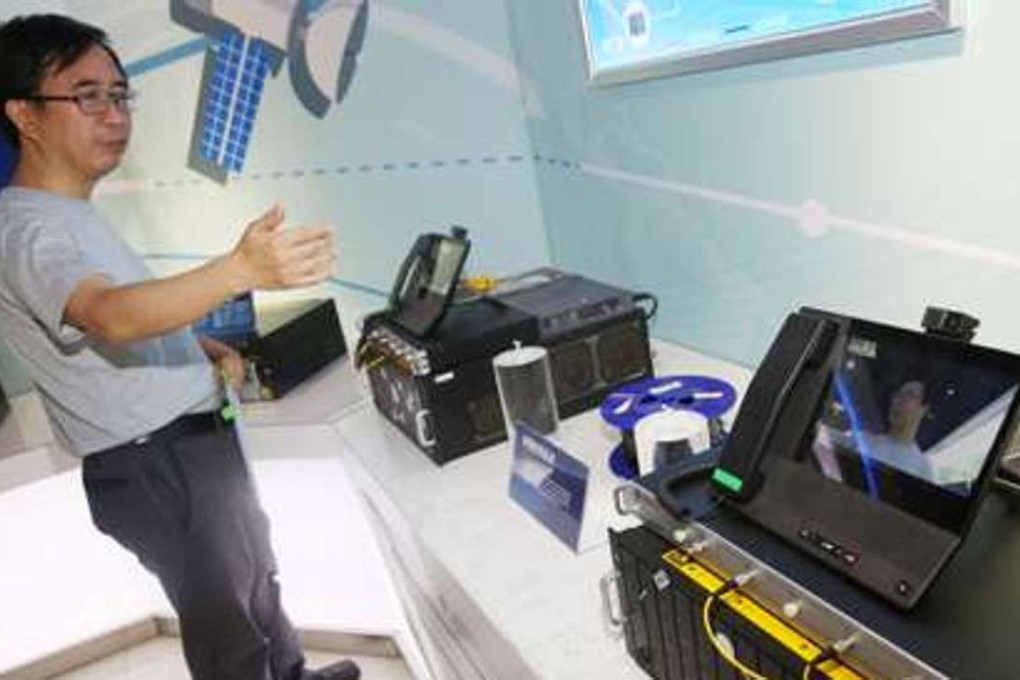 Pan Jianwei demonstrates quantum communication in Shanghai in May. Photo: Xinhua