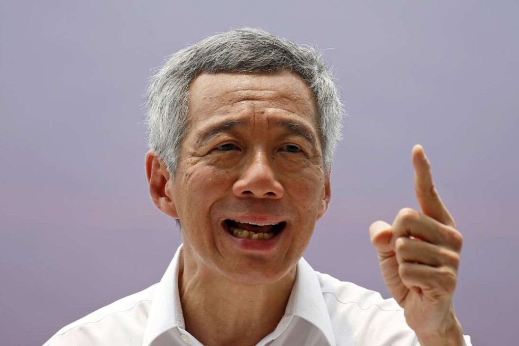 Lee Hsien Loong speaks at a lunchtime rally in the central business district in Singapore in 2015. Photo: Reuters