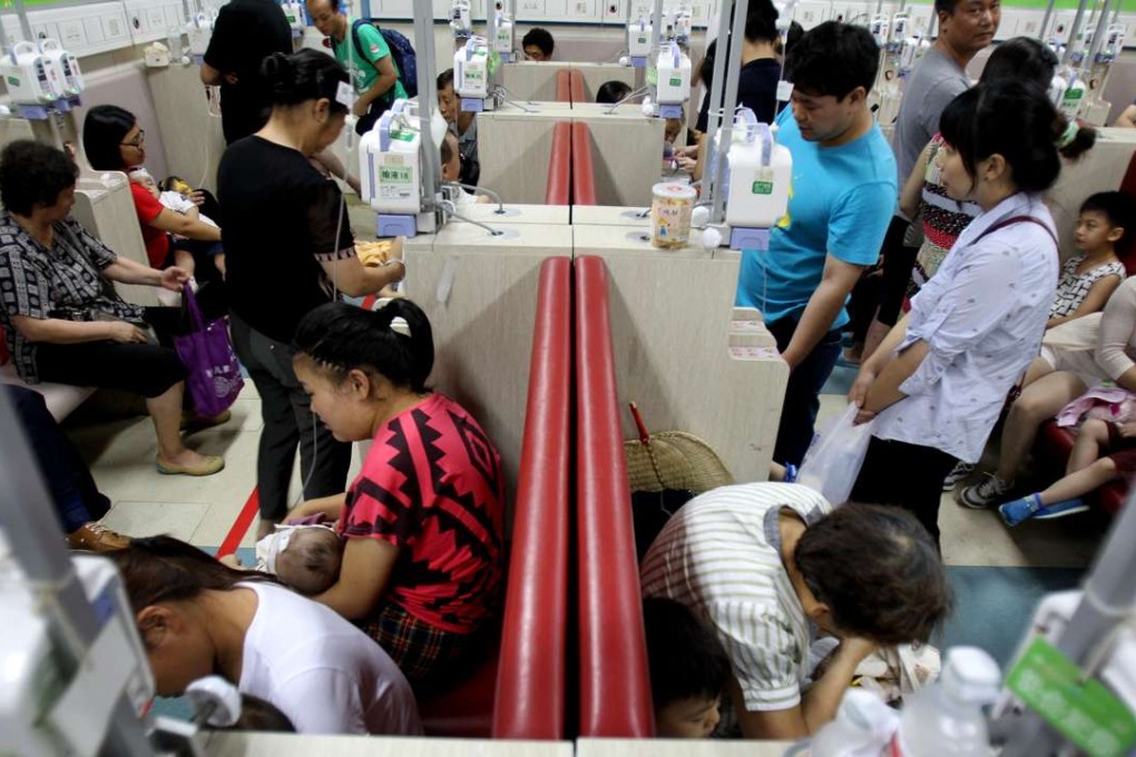 People wait for medical treatment at Fudan University’s Children's Hospital in Shanghai. Photo: Xinhua