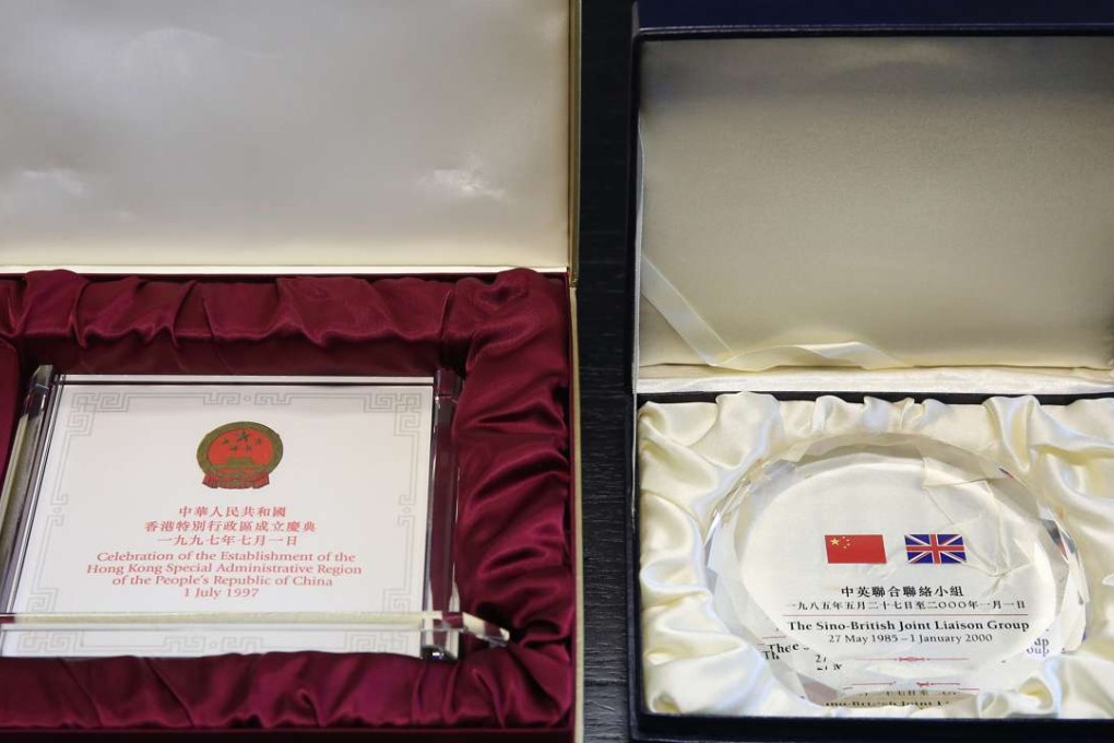 Rafael Hui’s commemorative plaques from the handover period are among the lots. Photo: Sam Tsang