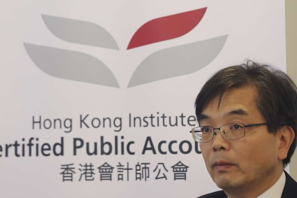 Raphael Ding Wai-chuen, chief executive of the Hong Kong Institute of Certified Public Accountants, says fewer companies plan to hire because of the negative economic outlook, with more than half of the respondents describing the next 18 months as uncertain. Photo: David Wong