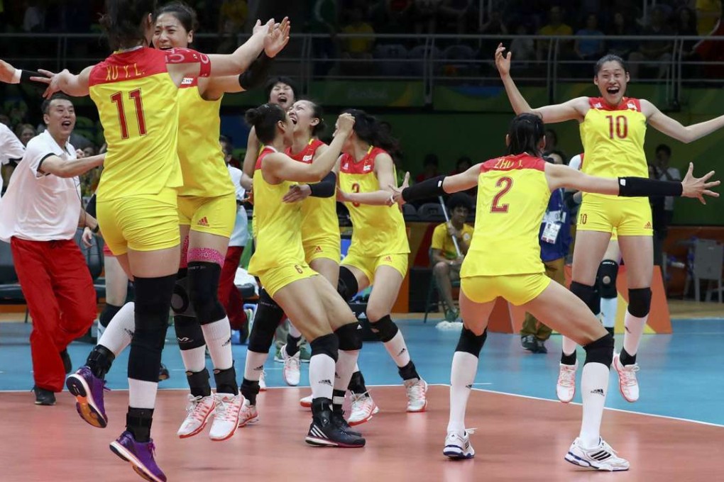 China’s players celebrate winning the gold medal match in the women’s volleyball competition. Photo: Reuters