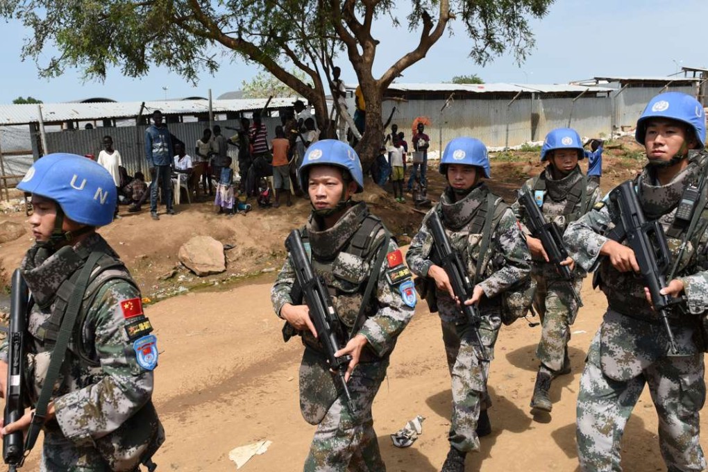 Chinese peacekeepers on patrol at the United Nations House in Juba, South Sudan this month. Photo: Xinhua