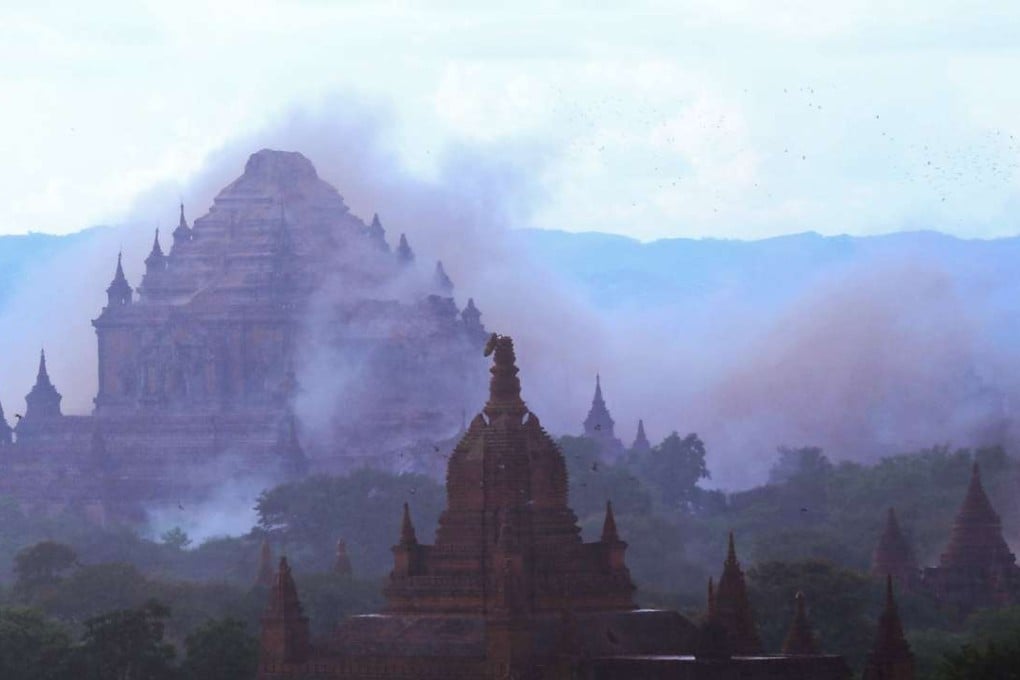 The ancient Sulamuni temple is seen shrouded in dust after a 6.8 magnitude earthquake hit Bagan on August 24. Photo: AFP