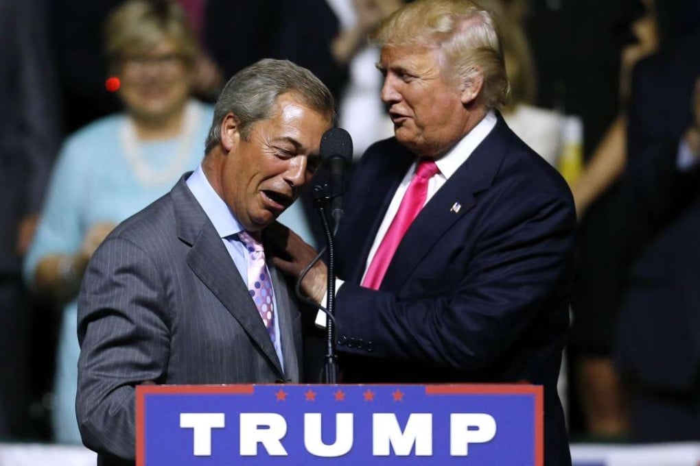 Republican Presidential nominee Donald Trump, right, greets former UK Independence Party leader Nigel Farage during a campaign rally in Jackson, Mississippi, on Wednesday. Photo: AFP