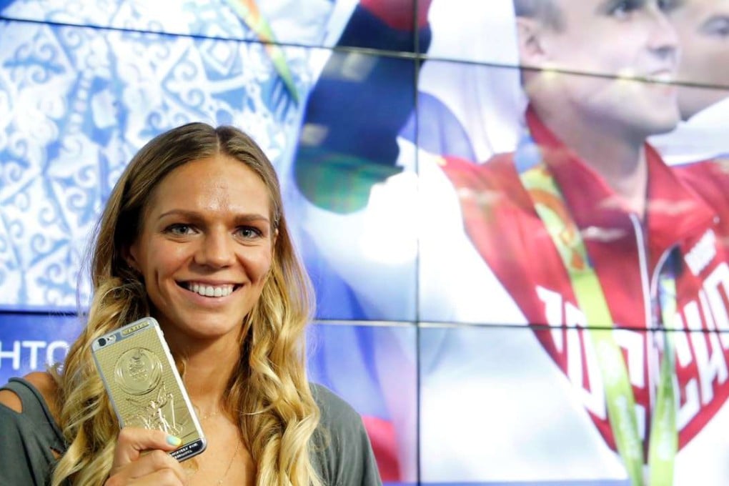 Yulia Efimova attends a news conference in Moscow. Photo: Reuters