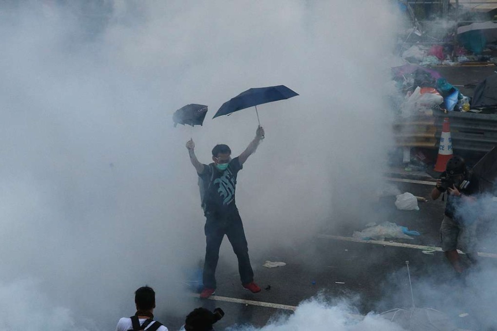 The police fire tear gas at protesters on Harcourt Road in Admiralty, Hong Kong, during Occupy Central. The movement will have enhanced Beijing’s suspicion and its determination to cut Hong Kong down to size. File photo