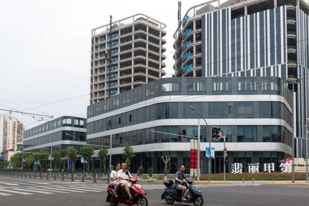 Indeed, the headlines do look promising.Land sales are notching up one record one after another in some Chinese cities. Photo: AFP