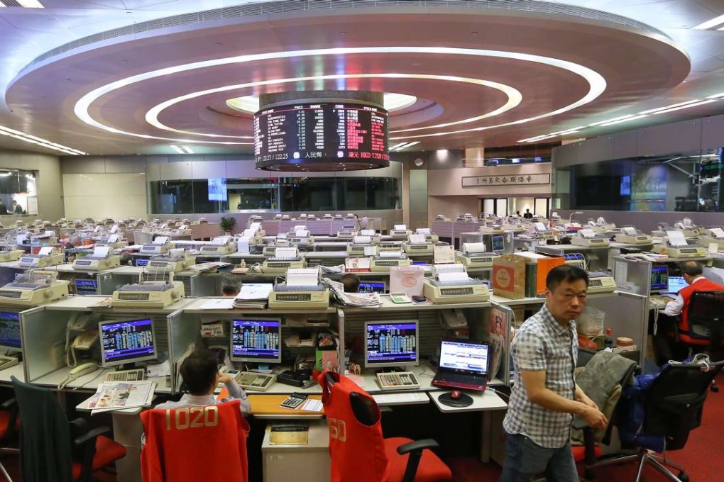 Hong Kong’s stock market is dominated by 14 large brokers. The smallest brokers have seen their combined share of the daily turnover shrink to 10 per cent, from 40 per cent in 1999. Photos: SCMP Pictures