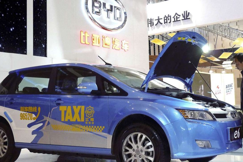 A BYD E6 electric car on display at the New Energy Auto Expo in Nanjing, Jiangsu province, in 2014. The company chairman expects sales of new energy vehicles will double to 120,000 units in 2016. Photo: Reuters