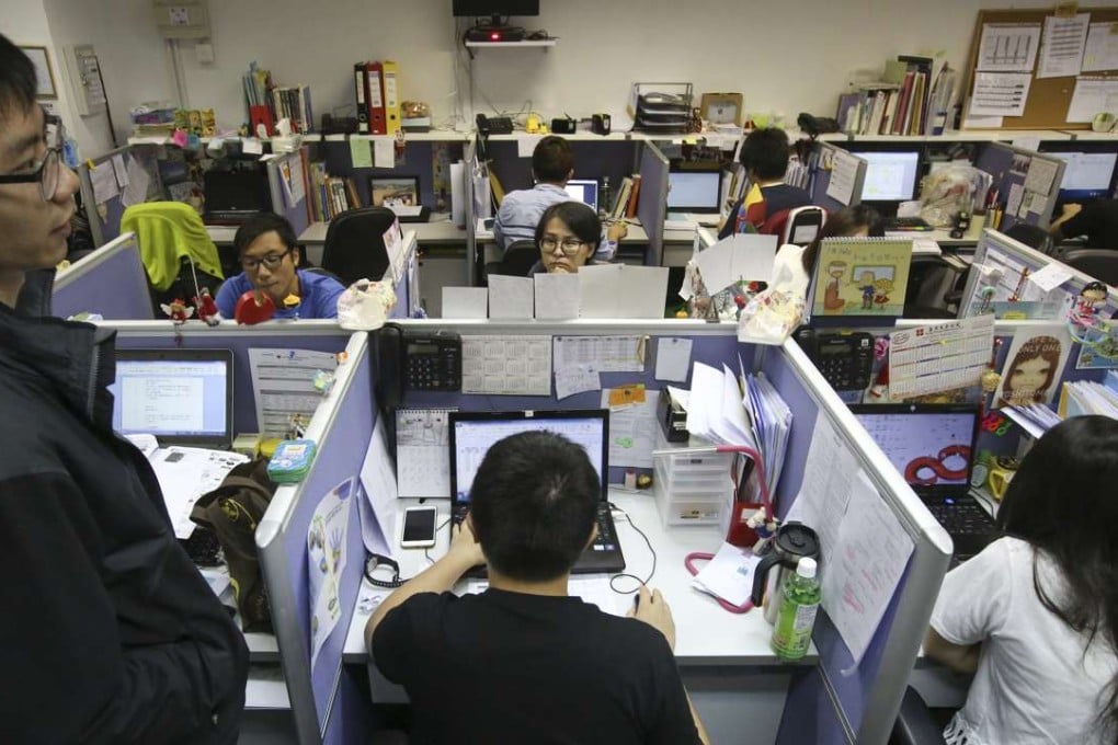 North District social workers having a meeting in limited office space in Sheung Shui.Photo: Nora Tam