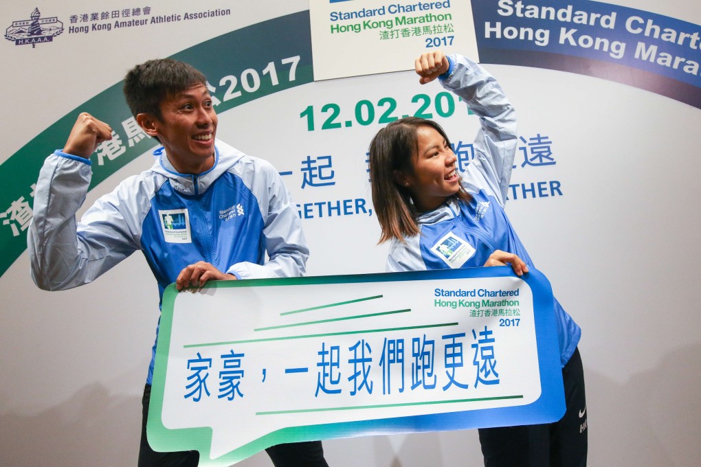 Chan Ka-ho, winner of the men’s 10km, and Christy Yiu Kit-ching, Olympic marathon runner, show their support. Photo: Felix Wong