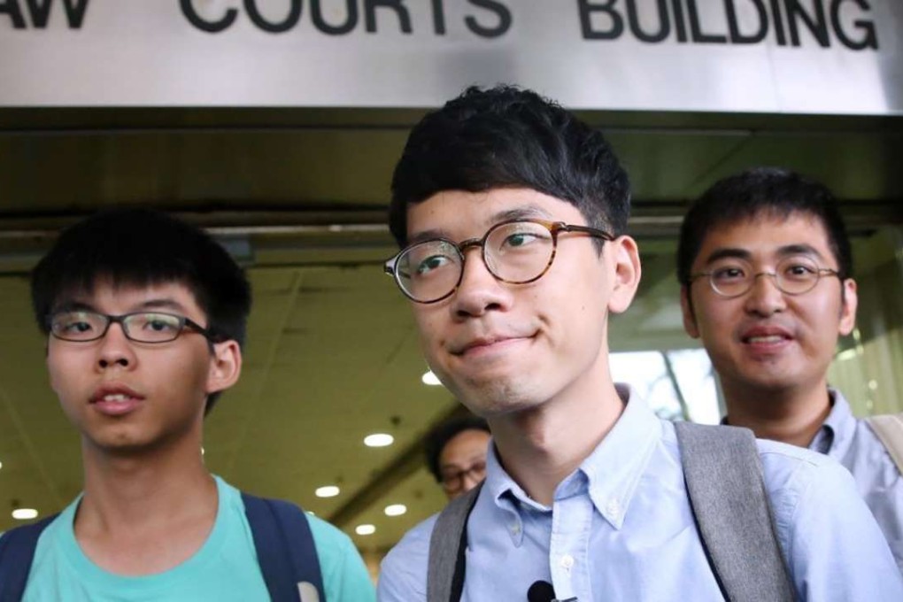 Joshua Wong Chi-fung, Nathan Law Kwun-chung and Alex Chow Yong-kang outside Eastern Court in Sai Wan Ho on Monday. Photo: Sam Tsang