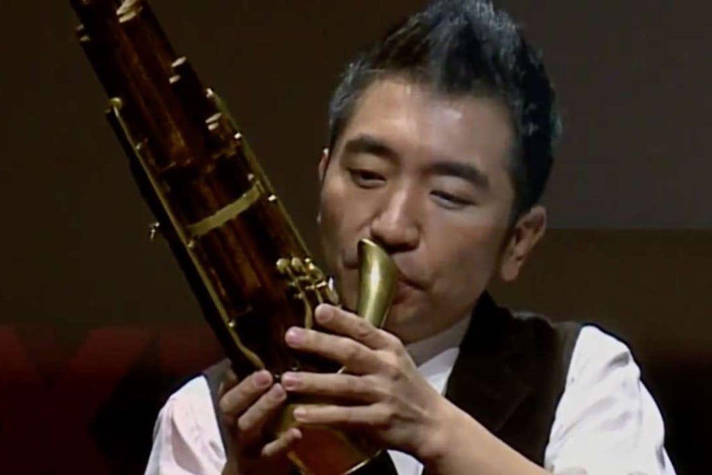 Wu Tong playing the sheng in Taipei in 2014.