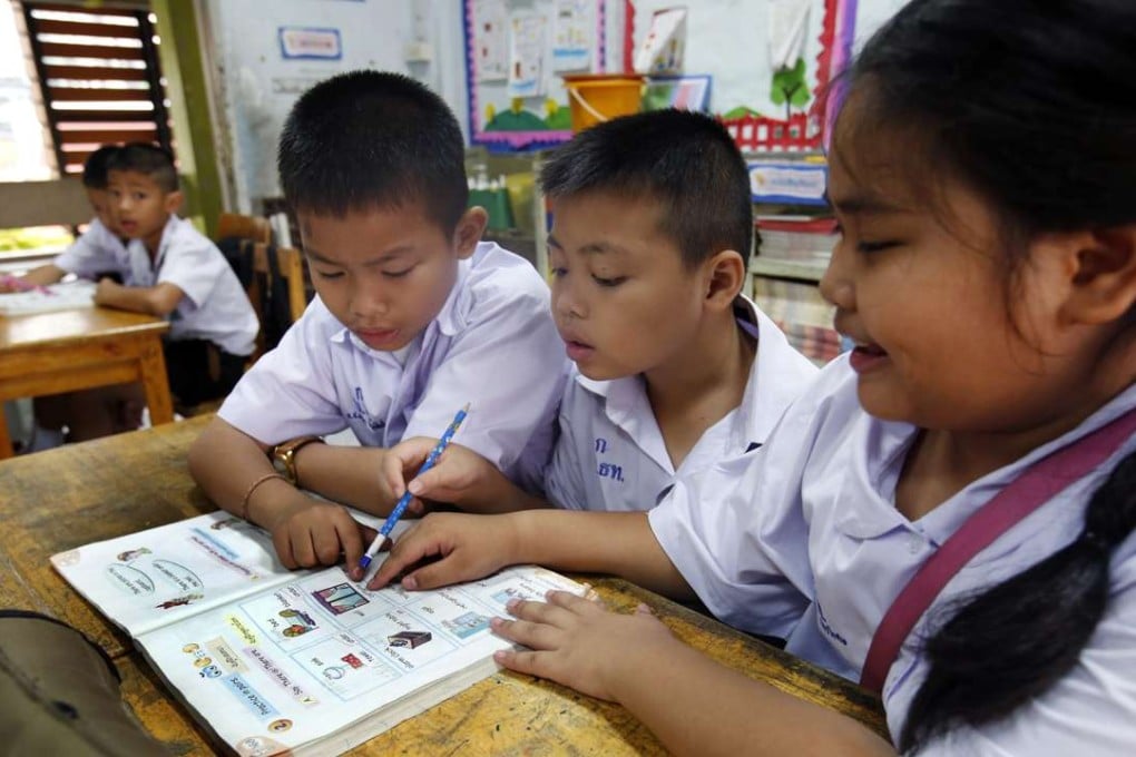 The Ministry of Education has embarked on a programme to ensure that all primary schoolchildren are able to speak enough English to handle everyday situations within 10 years. Photo: EPA