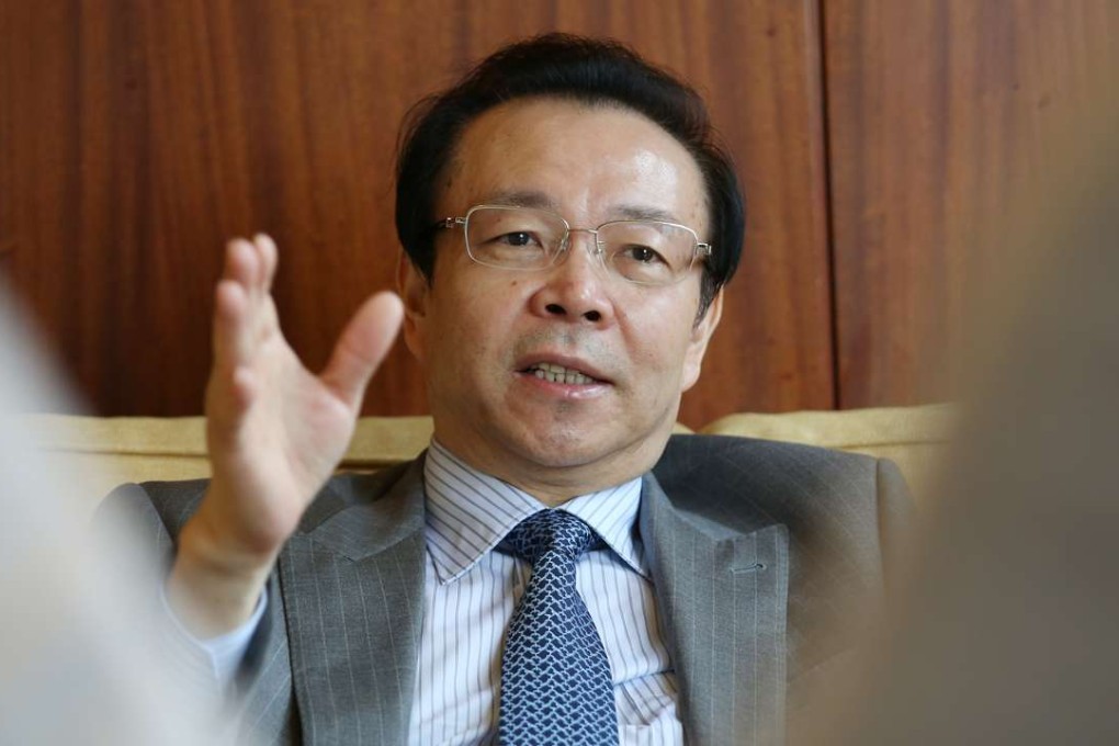 Huarong chairman Lai Xiaomin sees more positive than negative signals in terms of economic growth. Photo: May Tse