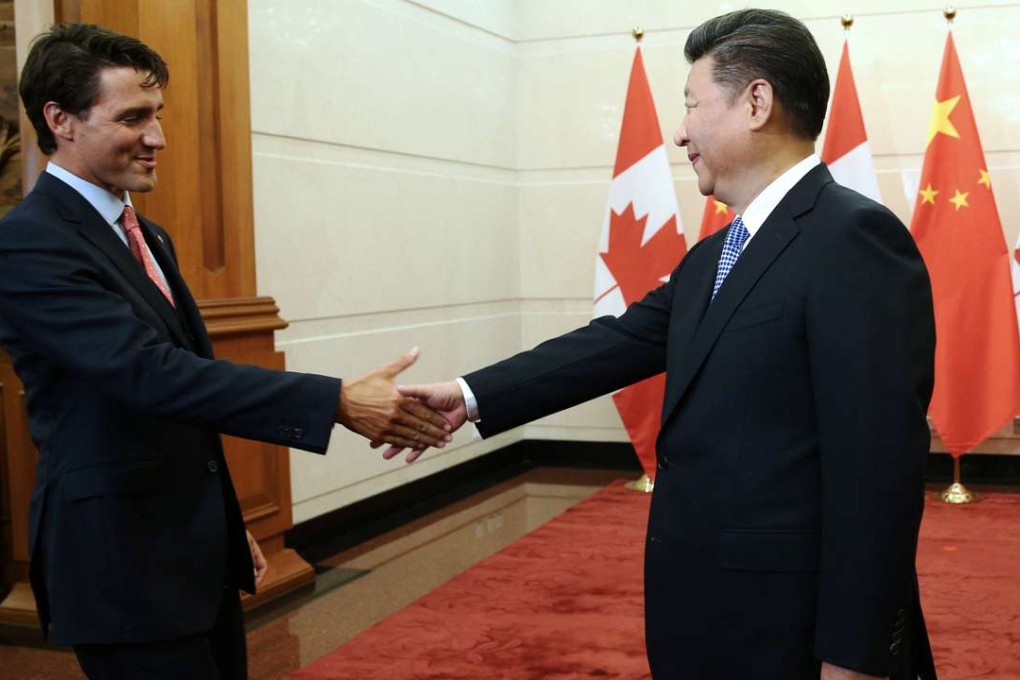 Canadian Prime Minister Justin Trudeau shakes hands with Chinese President Xi Jinping ahead of their meeting at the Diaoyutai State Guesthouse in Beijing. Photo: Reuters