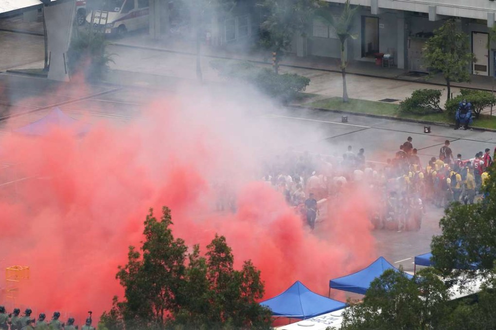 A large-scale riot drill being conducted at the Police Tactical Unit training ground in Fanling. Photo: SCMP