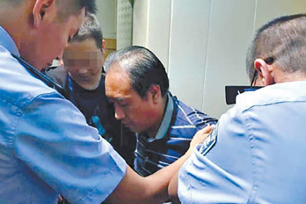 Gao Chengyong pictured during his arrest. Photo: SCMP Pictures