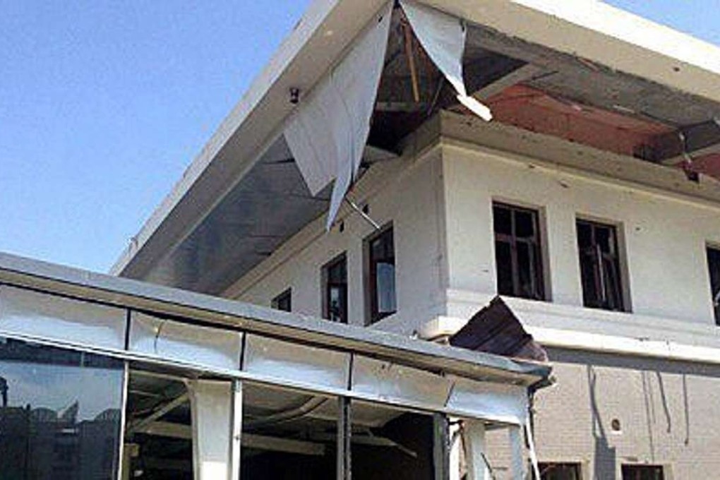 A suspected suicide bomber crashed a car through the entrance of the Chinese Embassy in the Kyrgyzstan capital of Bishkek, detonating a bomb which killed the attacker. Photo: EPA