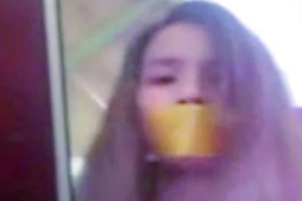 On a video sent to her husband, the woman appears to be tied up and struggling. Photo: SCMP Pictures