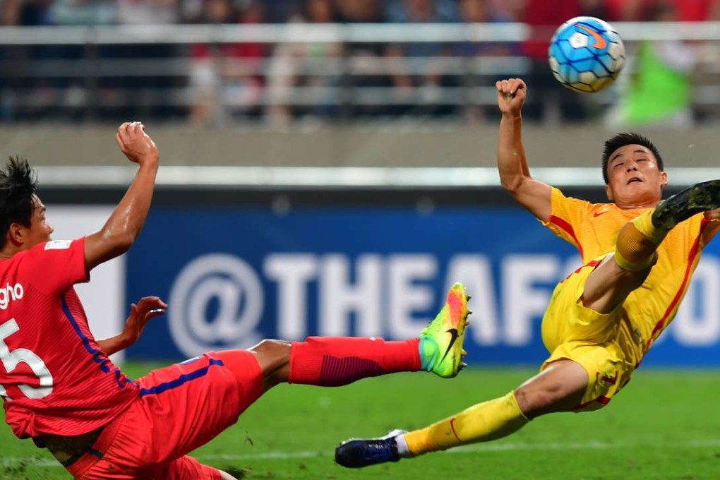 China’s Wu Lei in action against South Korea’s Hong Jeong-ho in Seoul. Photo: AFP