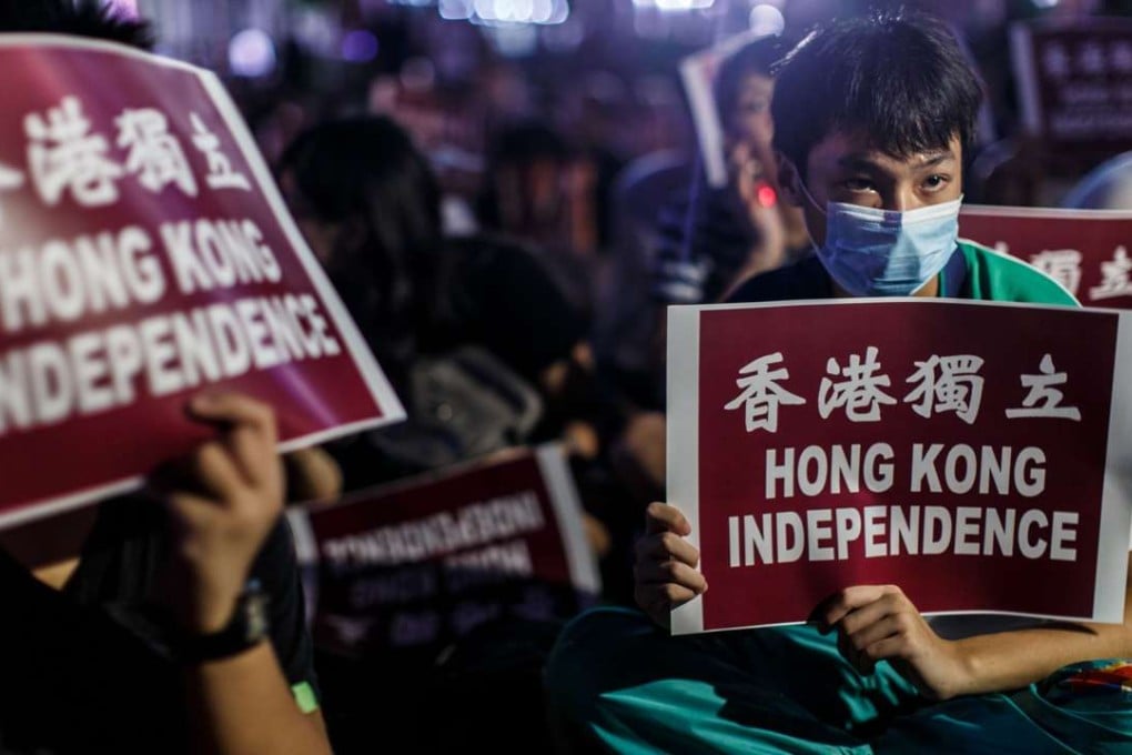 Pro-independence protesters gather outside government headquarters at a rally last month. Photo: AFP