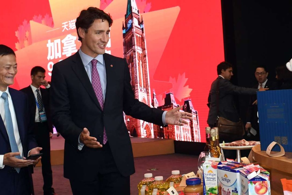 At Alibaba’s headquarters in Hangzhou on Saturday, Canadian Prime Minister Justin Trudeau and Alibaba chairman Jack Ma cast an eye over some of the Canadian products on sale at the online storefront. Photo: Xinhua