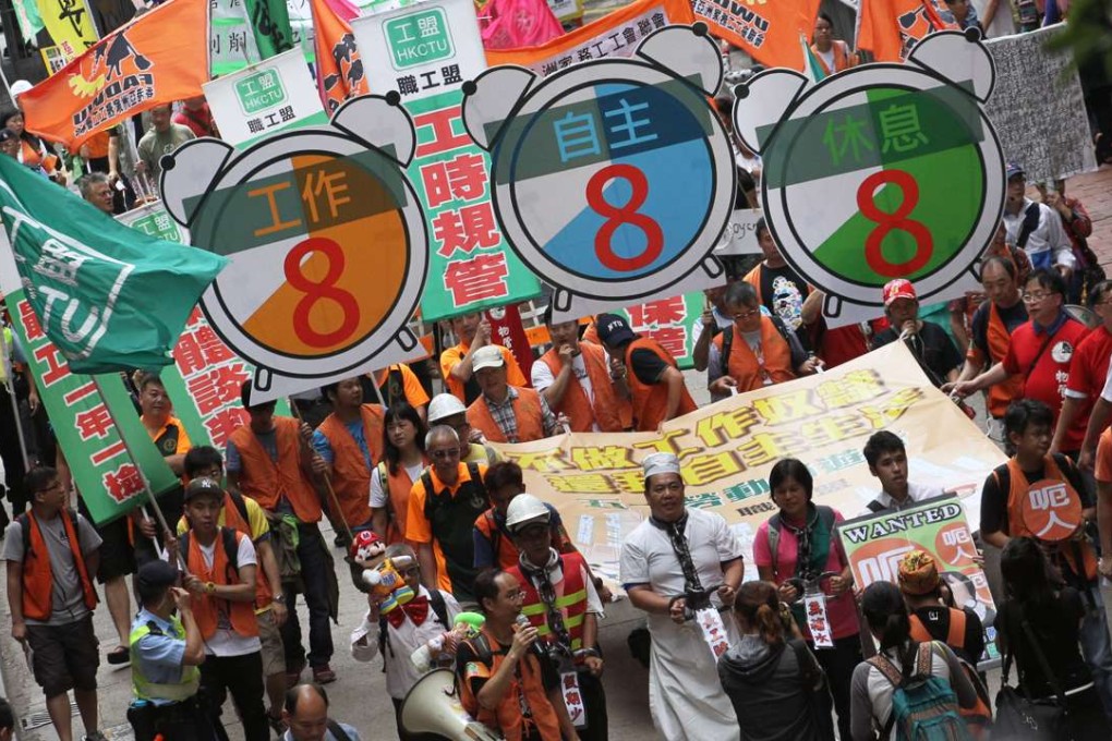 Protesters stage a May Day march to call for better wages and working conditions. Photo: Felix Wong