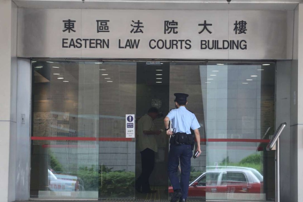 The alleged scammers appeared at the Eastern Court on Friday. Photo: Nora Tam