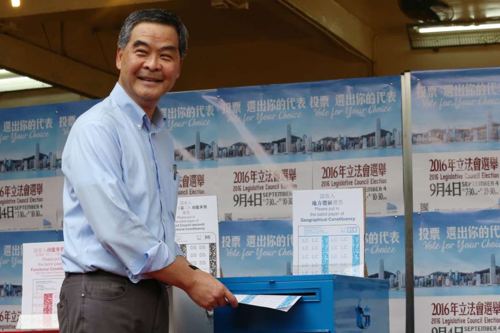 Chief Executive Leung Chun-ying casts his vote on Sunday morning. Photo: K. Y. Cheng