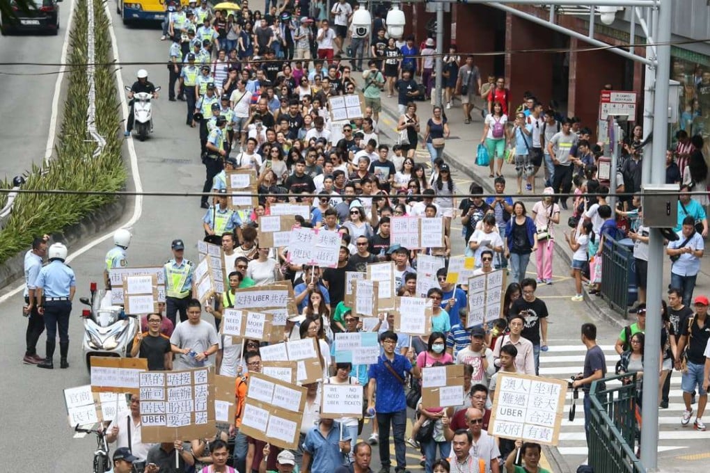 Supporters of Uber march for legitimation near Tap Seac Square in Macauhundreds ofProtesters marched from Tap Seac Square to the Macau government headquarters in Avenida da Praia Grande. 04SEP16 SCMP /Photo: Dickson Lee